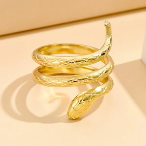 Punk style titanium steel snake wrap ring with detailed scale texture in golden finish