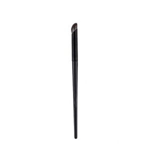 Professional black angled eyeliner and brow brush with synthetic bristles on white background