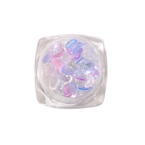 Mix of iridescent heart nail charms in jars with glitter and pearlescent finish