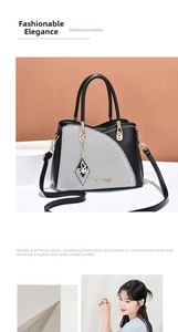 Detail presentation of houndstooth plaid handbag with metallic butterfly pendant