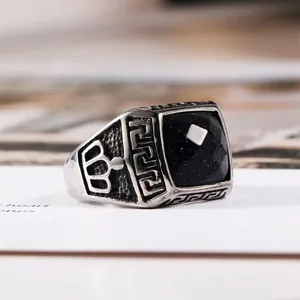 Vintage stainless steel ring with square blue goldstone and crown engravings