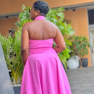 Hot pink backless halter maxi dress with high waist and flared skirt for summer style