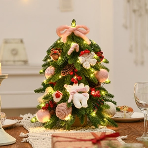 Mini Nordic desktop flocked Christmas tree with warm lights and felt bear ornaments