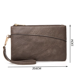 Brown textured leather envelope pouch with wristlet strap showing dimensions 20.6x13cm