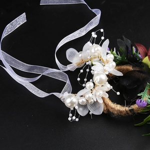 Detail of leaf hairband with gold wire, white pearls and sheer chiffon ribbon