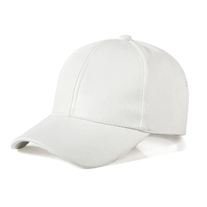 Close-up of premium white baseball cap showing smooth texture and fine stitching detail
