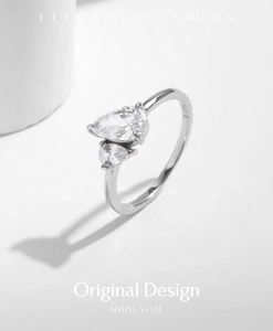 Macro view of S925 sterling silver ring featuring double pear-shaped zircon stones