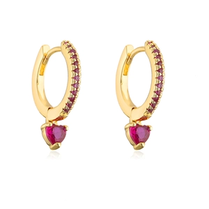 Close-up of 18K gold plated copper earrings with red heart-shaped zircon stones