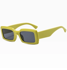 Detail of trendy neon yellow rectangular sunglasses with thick frames and dark grey lenses