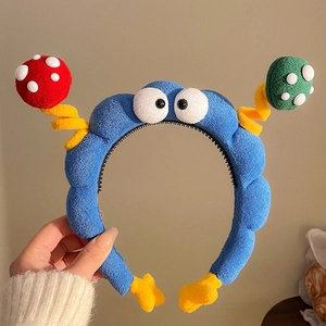 Cerchietto divertente in peluche con funghi a pois e grandi occhi per acconciature