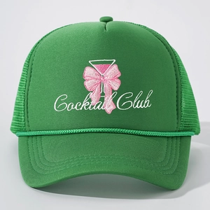 Green mesh trucker hat with pink bow and Cocktail Club embroidery for outdoor wear