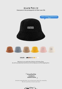 Detail view of lambswool bucket hats in seven colors with Hai Talent M embroidery
