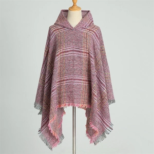 Plaid hooded poncho cloak in pink and yellow cashmere-like knit with fringe tassels