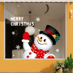 Detail of Christmas snowman window sticker with Merry Christmas text on glass
