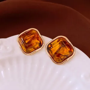 Vintage amber resin square stud earrings with polished gold metal edges for women