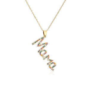 Close-up of gold Mama necklace with rainbow cubic zirconia inlay and 18K gold plating
