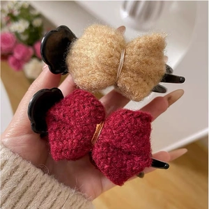 Knit bow hair clips in beige and wine red colors for elegant ponytail styling