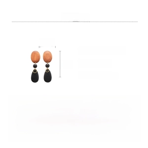 Macro detail of geometric wooden bead drop earrings with 12cm length and 22.9g weight