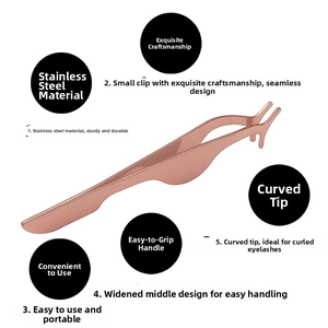 Macro detail of rose gold stainless steel eyelash applicator with curved tip and wide handle