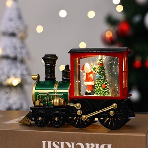 Vintage green and red Christmas train lantern with Santa Claus and LED snow globe light