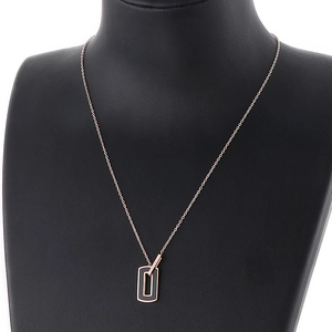 Rose gold square pendant necklace with black resin inlay and Lucky engraving on sleek chain