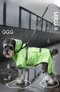 Detail of waterproof pet raincoat with reflective safety strips and clear face mask