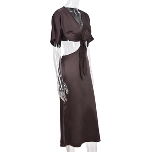 Detail of chocolate brown satin dress with side waist cut-out and tie-front V-neckline