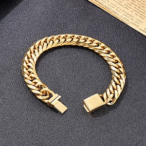 Detailed close-up of a bold golden Cuban link bracelet with square buckle on dark texture