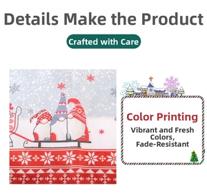 Detail of Christmas gnome printed fabric with red snowflake border and festive pattern