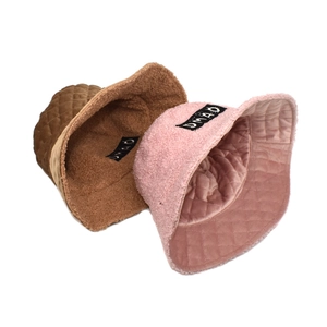 Padded diamond quilted bucket hat for women in brown and pink velvet with sherpa lining