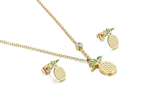 Detailed view of gold plated pineapple pendant necklace and stud earrings set with rhinestones