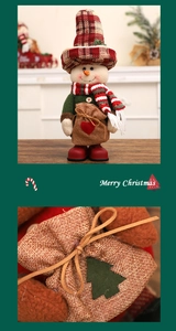 Close-up of a burlap gift bag on a Christmas snowman doll with festive red heart pattern