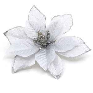 Close-up of silver glitter artificial Christmas flower with sparkling petal details