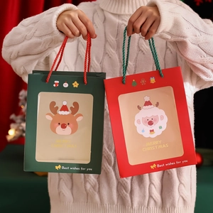 Transparent Christmas gift bags in forest green and red with PVC window and carry handle