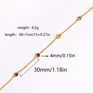 Detailed dimensions of gold chain necklace with colorful round stones on white background