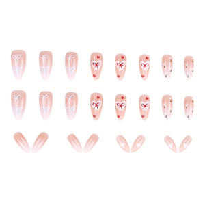 Almond press-on nails with red bow, floral patterns and pink gradient finish