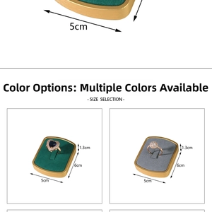 Detail view of gold metal ring display stand with luxury velvet lining and size markings