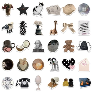 Set of 60 minimalist black and white stickers with coffee and bear designs for DIY crafts