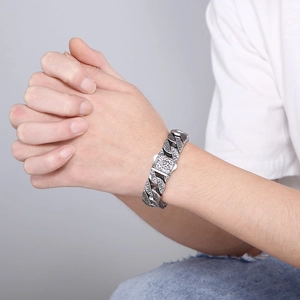 Vintage oxidized silver titanium steel bracelet with intricate engraved pattern for men