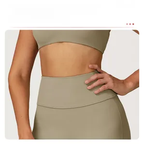 Close-up of high-waisted yoga flared pants with a wide waistband for tummy control