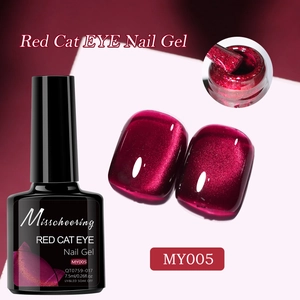 Deep red cat eye nail polish bottle with brush detail and glossy magnetic finish swatches