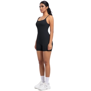 Side view of black skin-feel yoga bodysuit with tank straps and slim fit design