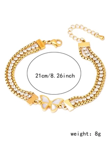 Detail view of gold butterfly bracelet showing 21cm length and 8g weight specs