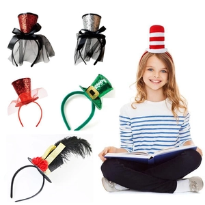 Close-up of glitter mini top hats with feathers and mesh for Halloween party headbands