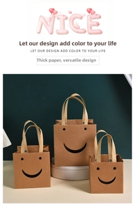 Detail of kraft paper gift bags with smiley face cutout and reinforced rivet handles
