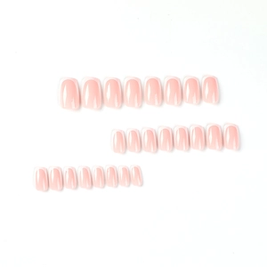 Classic white French manicure nail tips with light pink base and glossy square oval shape