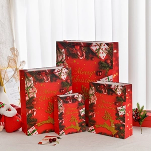 Extra large red Christmas gift bags with gold foil lettering in various sizes