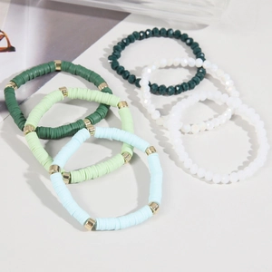Detail of 6-piece bohemian set with colorful heishi clay beads and faceted crystal beads