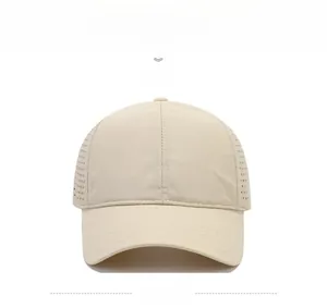 Detail of beige quick-dry baseball cap with laser-cut ventilation holes and precise stitching