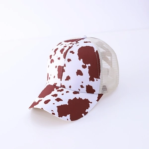 Breathable baseball mesh cap featuring brown cow print pattern and white mesh back